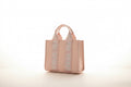 Petit sac de soirée rose Guess